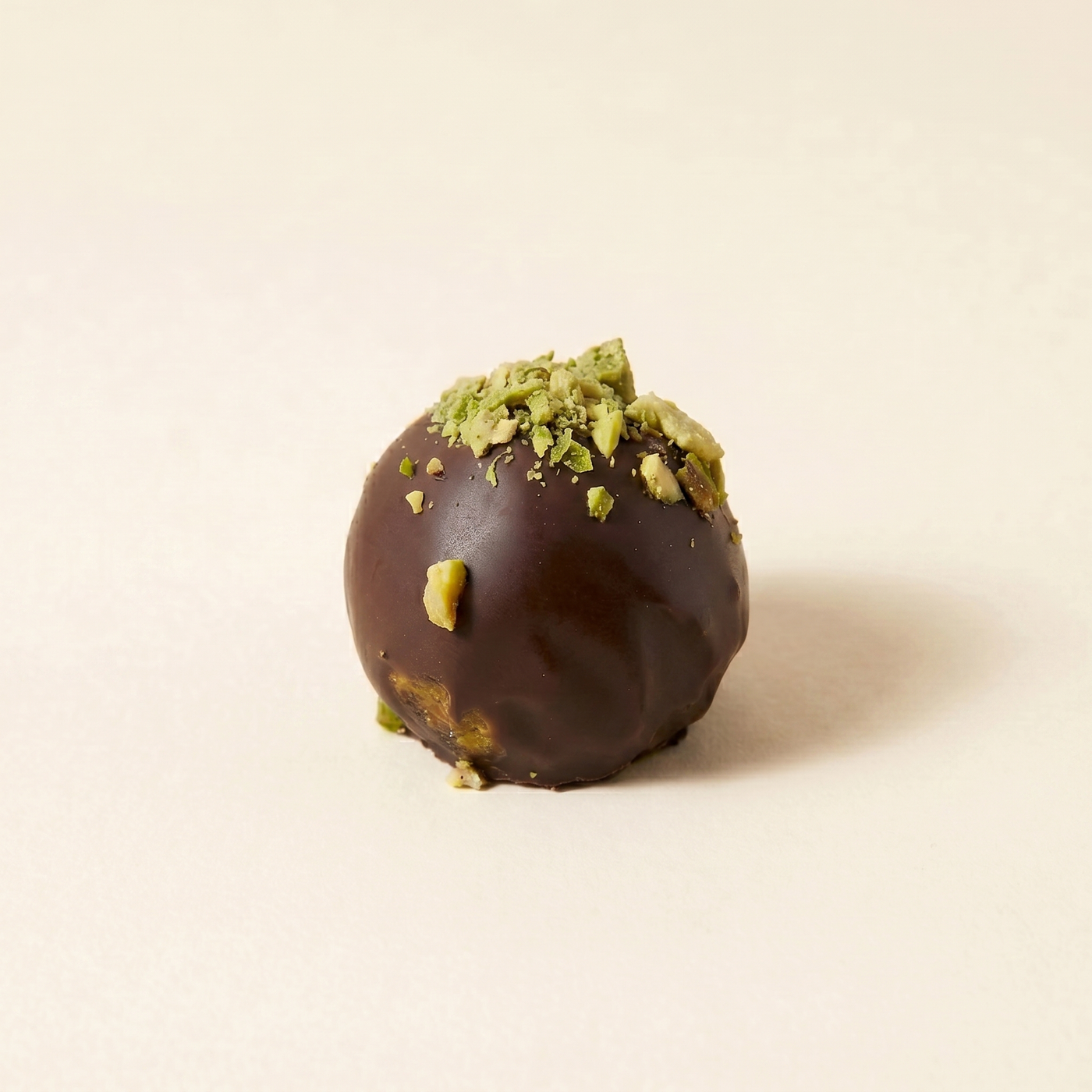 matcha pistachio date truffles in 70% dark chocolate