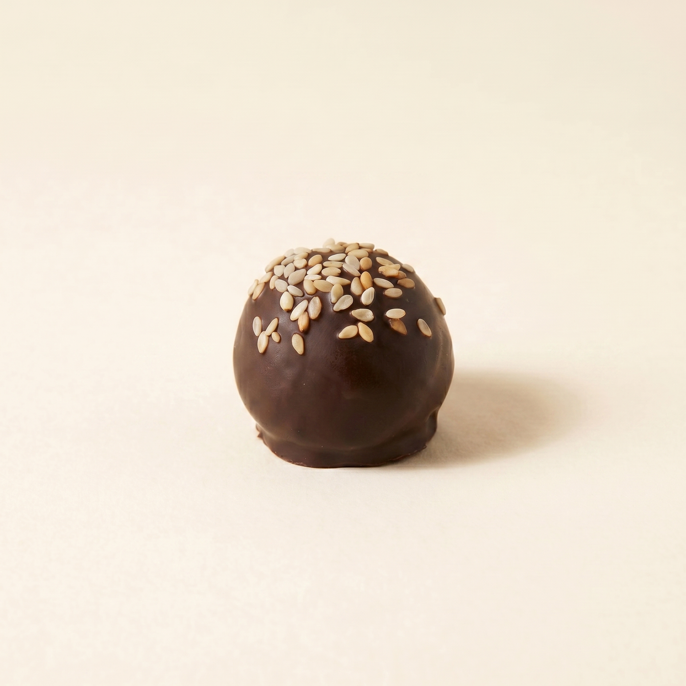 sesame date truffles in 70% dark chocolate
